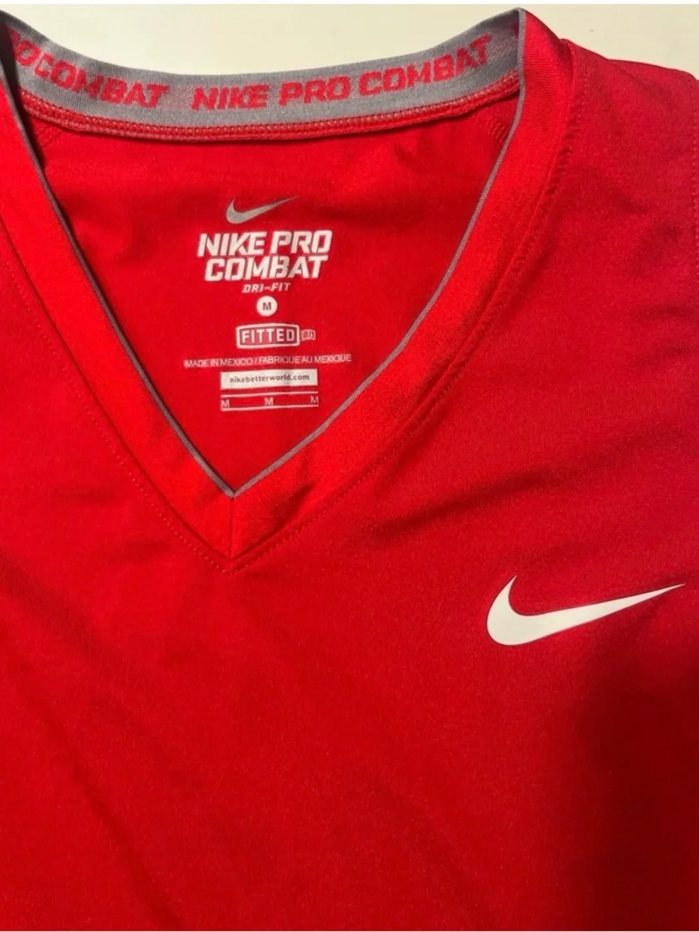 Nike Red V-Neck Sleeveless Athletic Top with White Swoosh